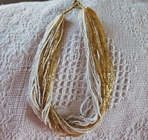 Elegant Gold and White Beaded Necklace